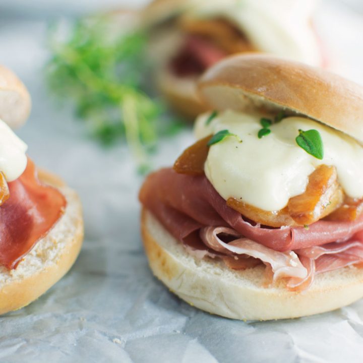 Prosciutto & peaches with a creamy brie sauce make these delectable Bagel Sliders - Find the #recipe @LittleFiggyFood