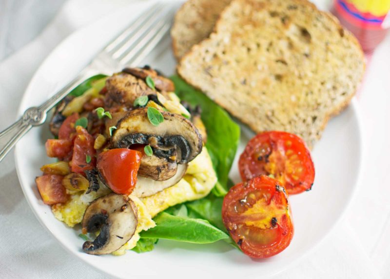 Try this Easy to Make Omelette with lots of Veggies! A tasty way to start your day or enjoy as a light dinner. Find the recipe @LittleFiggyFood