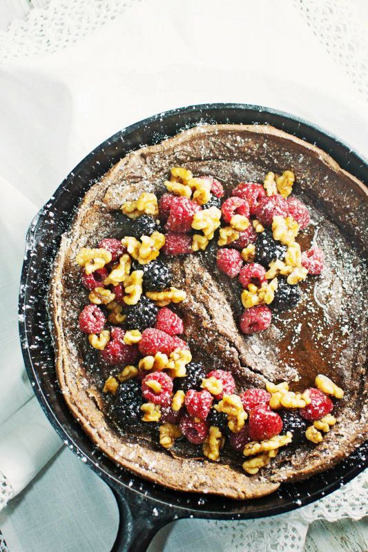 Chocolate Dutch Baby served with fresh fruit and drizzles of warmed maple syrup and toasted walnuts! Sunday Brunch Ideas