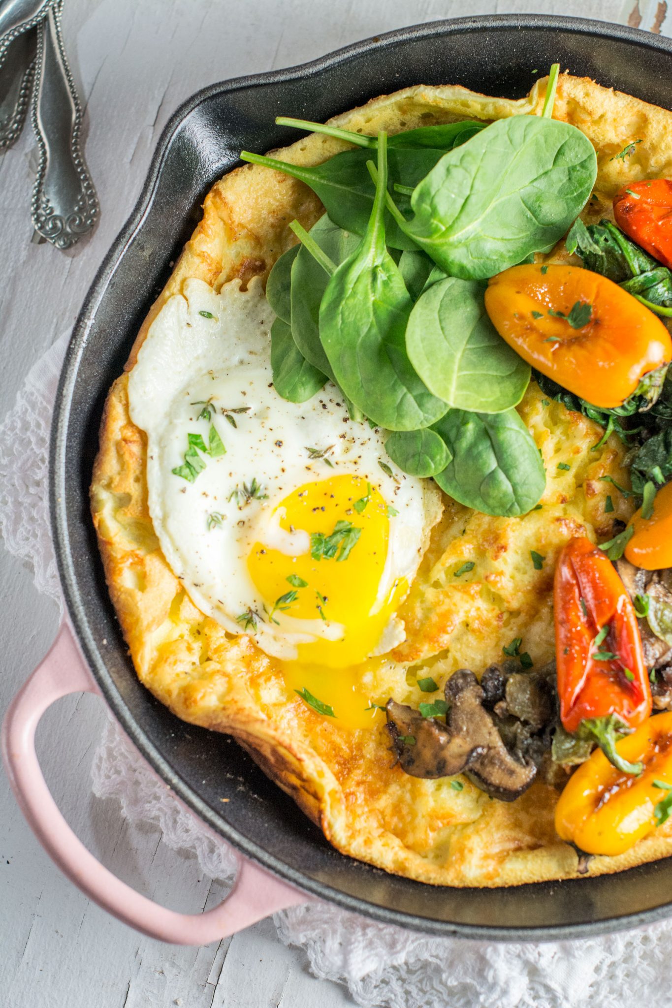 Savory Dutch Baby being served along with @enjoyPampelonne and made in my favorite skillet from @LeCreuset. Get the recipe at Little Figgy Food. #ad #LeCreusetLove #EnjoyPampelonne