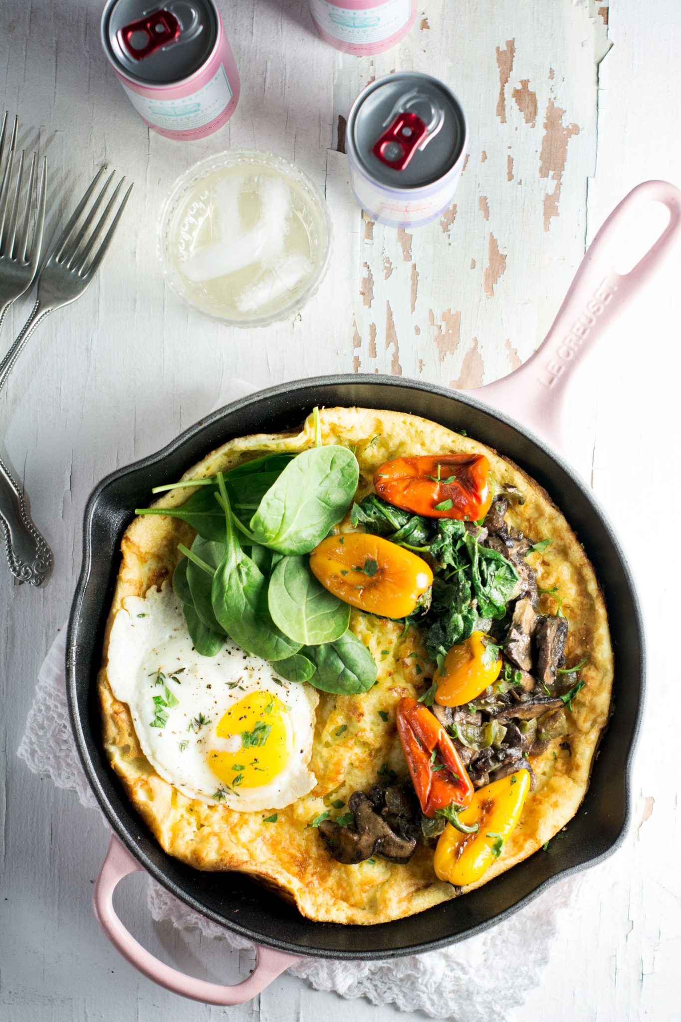Savory Dutch Baby being served along with @enjoyPampelonne and made in my favorite skillet from @LeCreuset. Get the recipe at Little Figgy Food. #ad #LeCreusetLove #EnjoyPampelonne