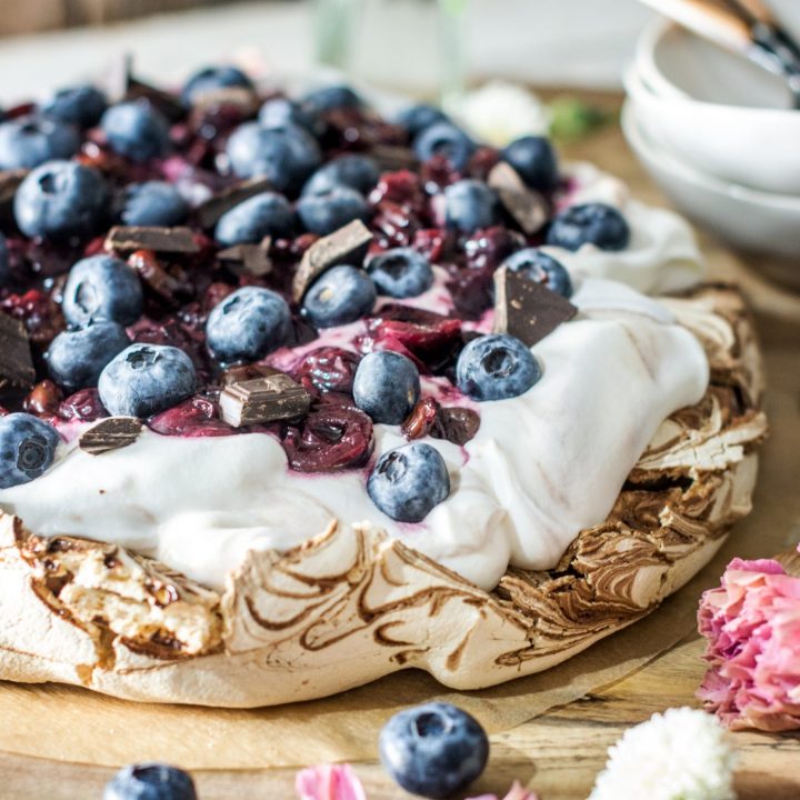 Up close and personal Chocolate Pavlova with Cherries and Blueberries. Get the Recipe at Little Figgy Food. @WorldMarket # #worldmarkettribe #ad