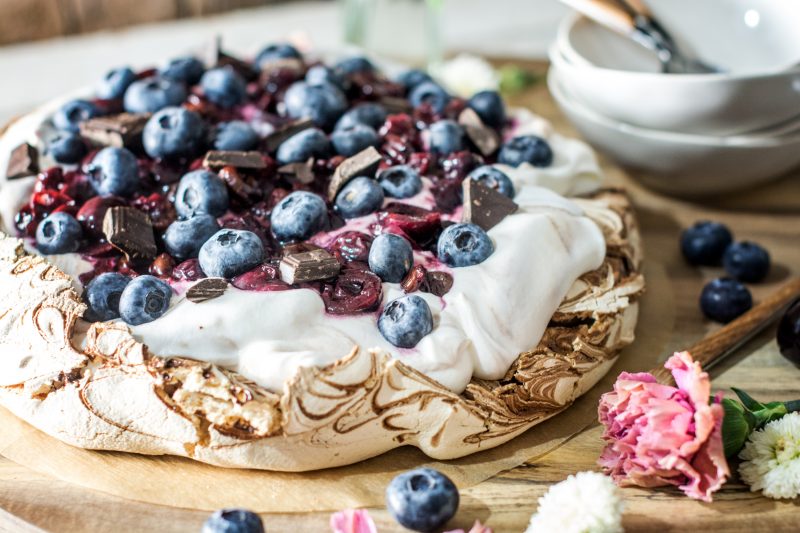 Up close and personal Chocolate Pavlova with Cherries and Blueberries. Get the Recipe at Little Figgy Food. @WorldMarket # #worldmarkettribe #ad