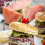Chimichurri Burger Recipe with avocado, onions, tomatoes on a brioche bun