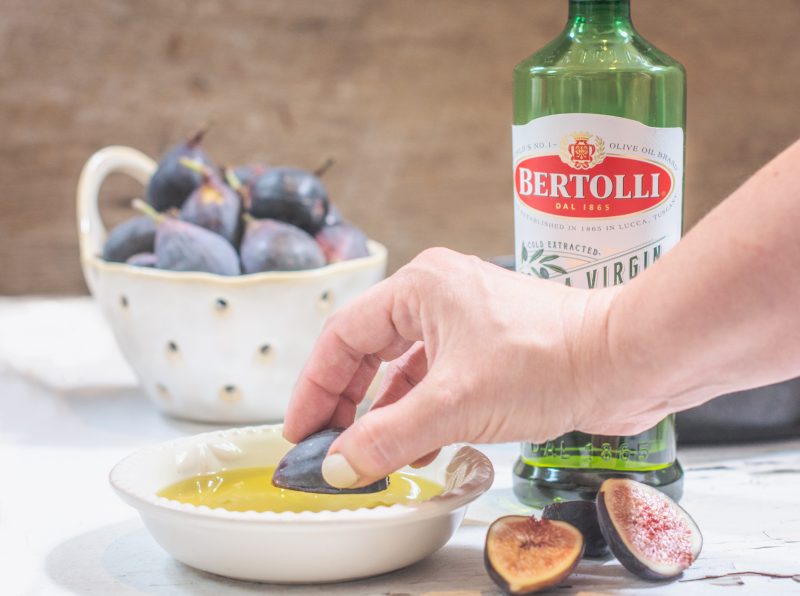 Fresh figs dipped in Bertolli Extra Virgin Olive Oil, then gently grilled to make a gorgeous grilled fig salad!