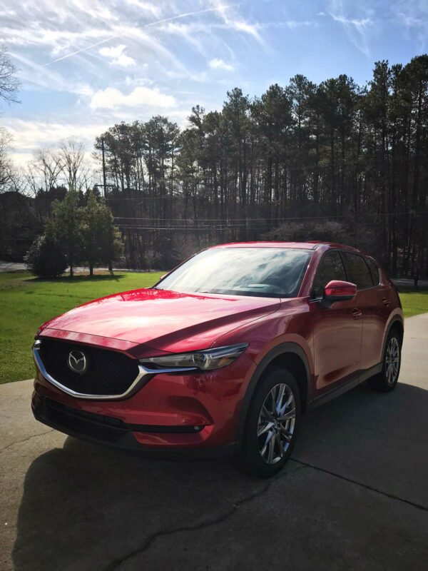 Red Mazda CX-5 on a sunny day