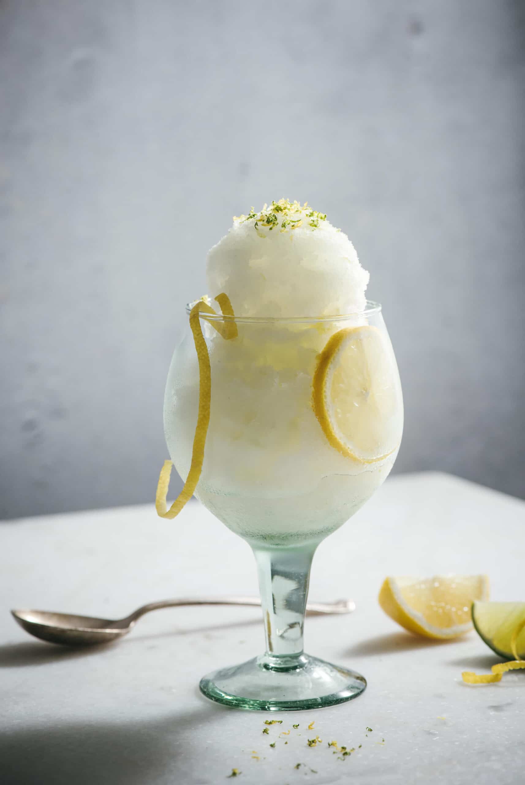 refreshing lemon sorbet with gin and tonic cocktail flavors in a glass