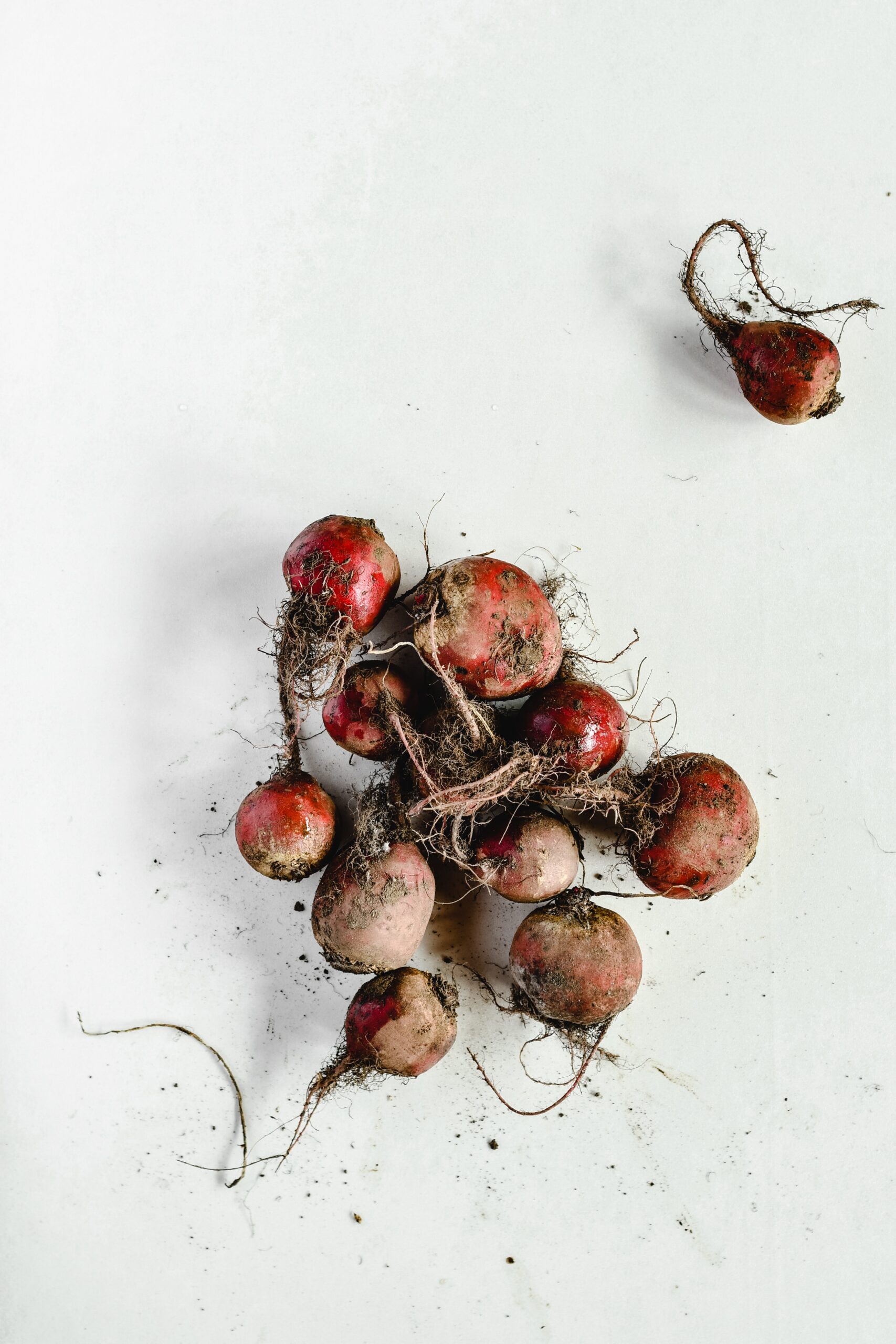 Winter produce food storage - beets - root vegetables - beets on white table