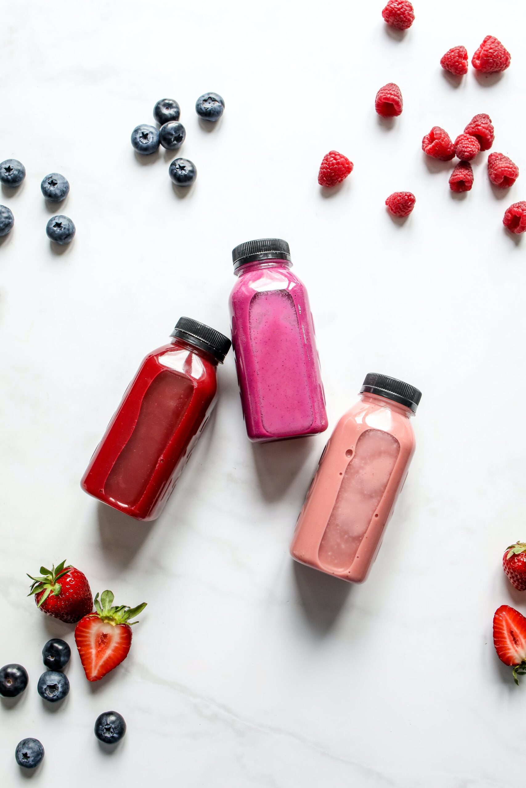 Ways to enhance the taste of fruit juice - bottles of juice on table
